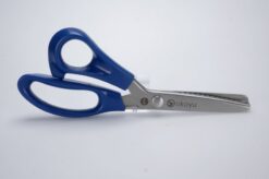 venstrehåndet takkesaks til venstre hånd