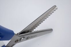 venstrehåndet takkesaks til venstre hånd