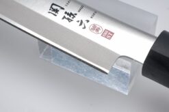 Japansk venstrehåndet Yanagiba-kniv fra Kai Seki Magoroku Hekiju-serien med et 21 cm langt blad og et ergonomisk håndtag til venstrehåndede. Perfekt til filetering og præcise udskæringer af fisk og kød